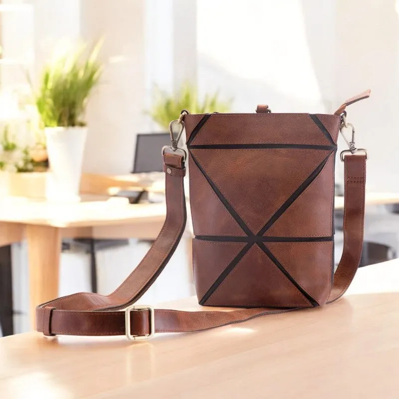 5935 - SLING BAG; WRISTLET