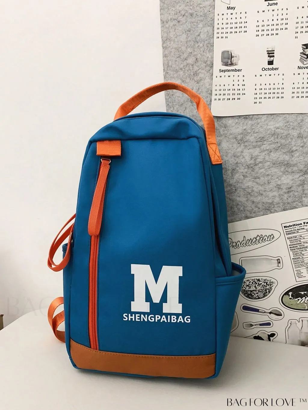BagForLove - Colorblocked Sling Bag: Letter Print, Adjustable Strap, Includes Bag Charm