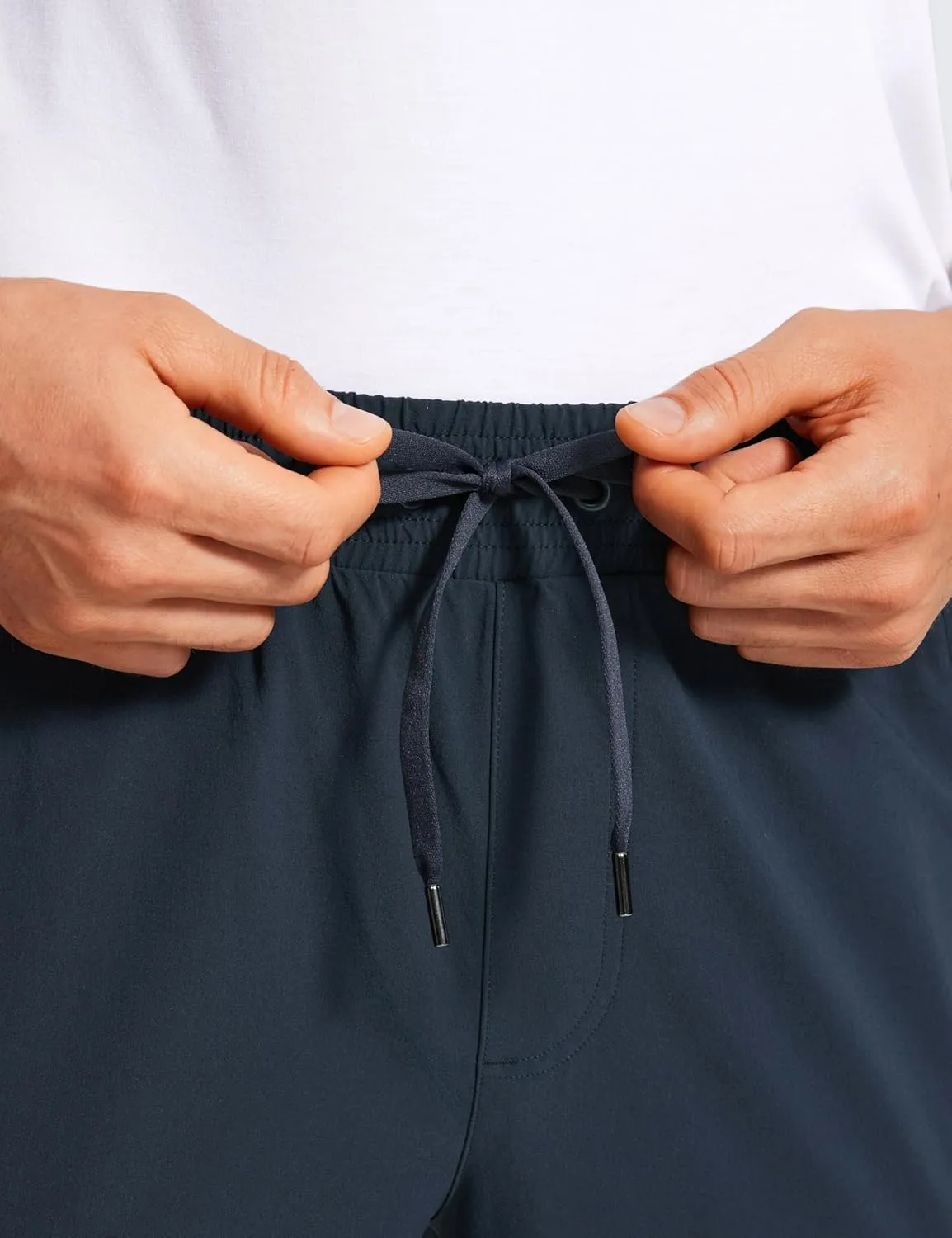 CRZ YOGA Athletic Joggers for Men 29"/31" Lightweight Water Resistant Outdoor Workout Pants with Zip Pockets