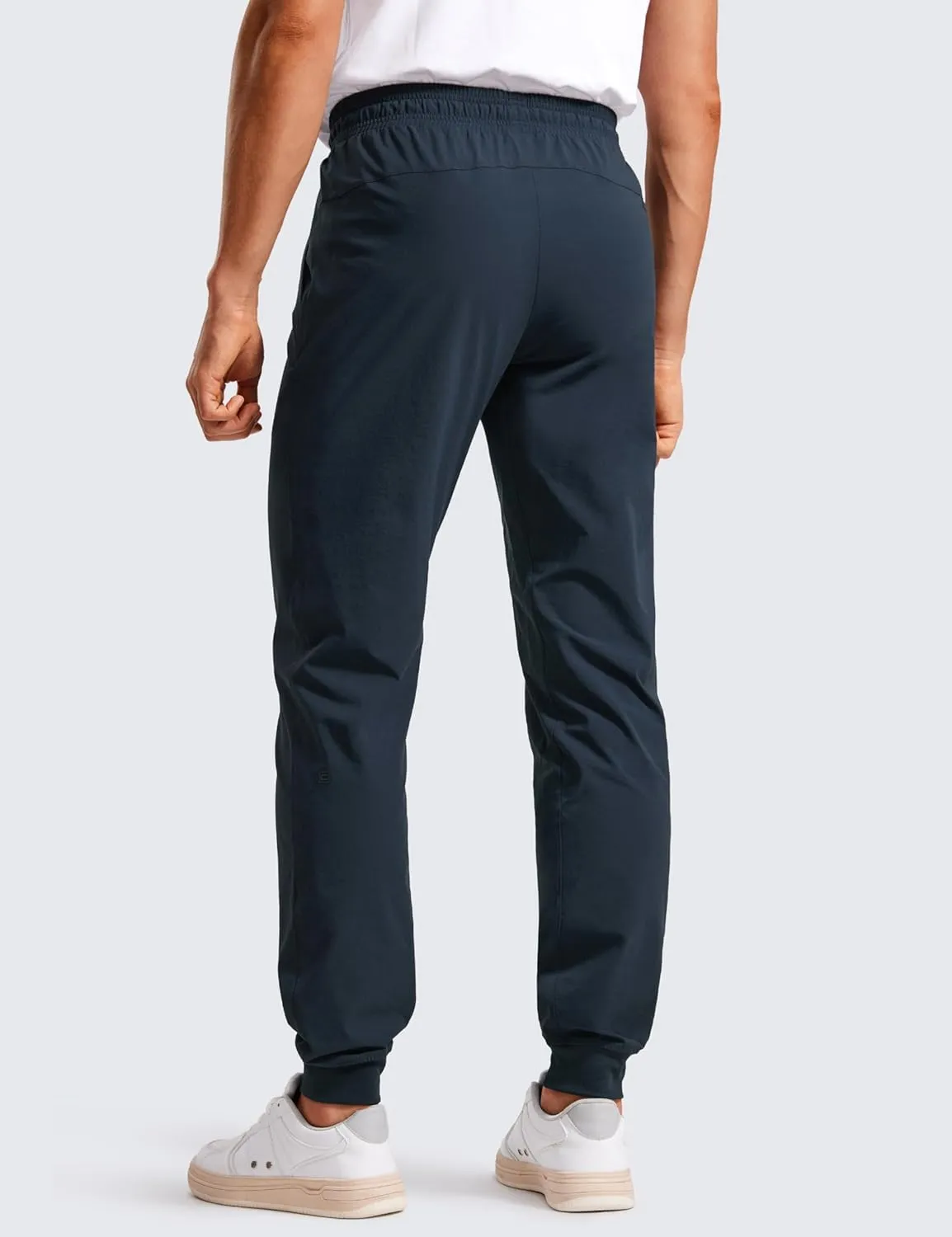 CRZ YOGA Athletic Joggers for Men 29"/31" Lightweight Water Resistant Outdoor Workout Pants with Zip Pockets