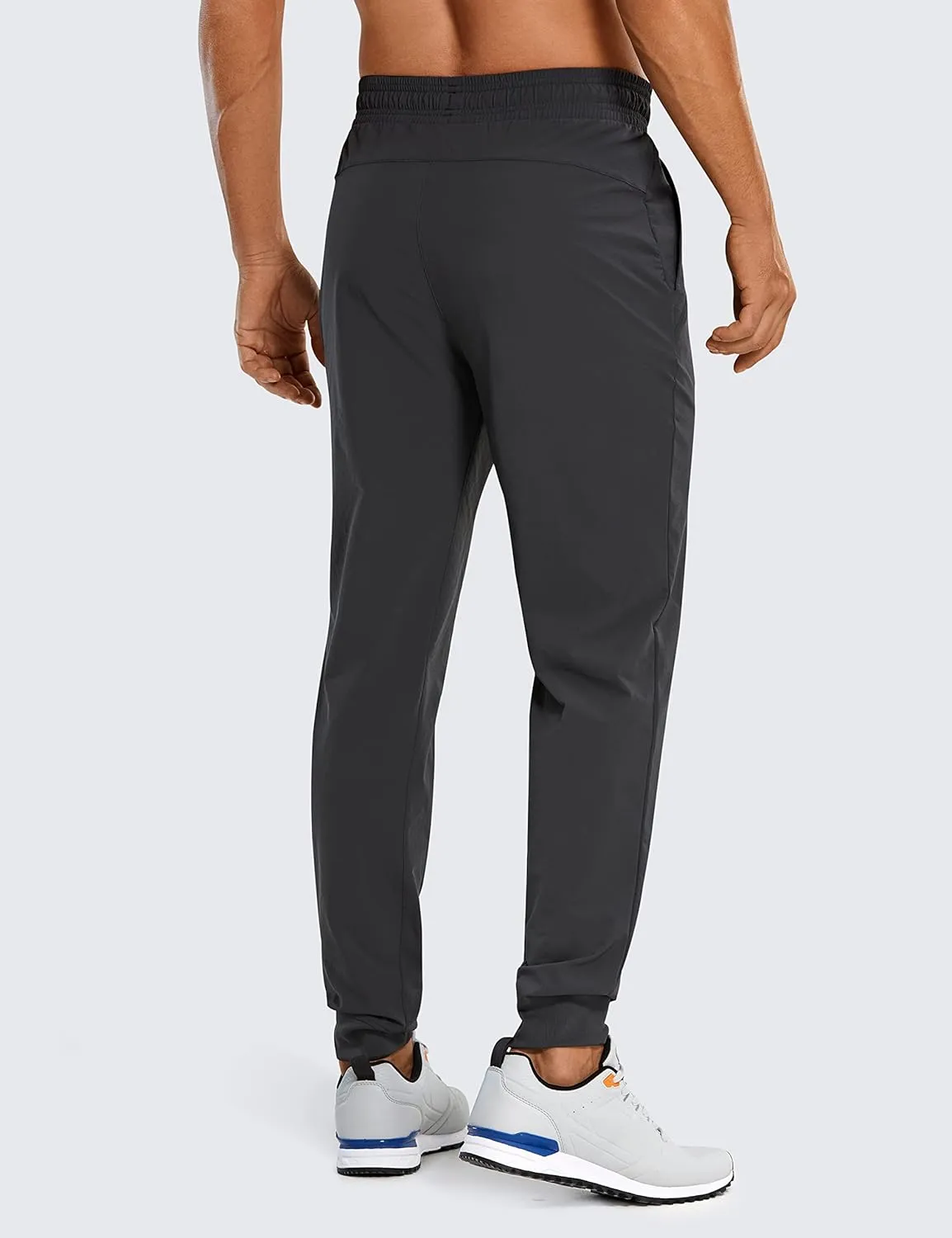 CRZ YOGA Athletic Joggers for Men 29"/31" Lightweight Water Resistant Outdoor Workout Pants with Zip Pockets