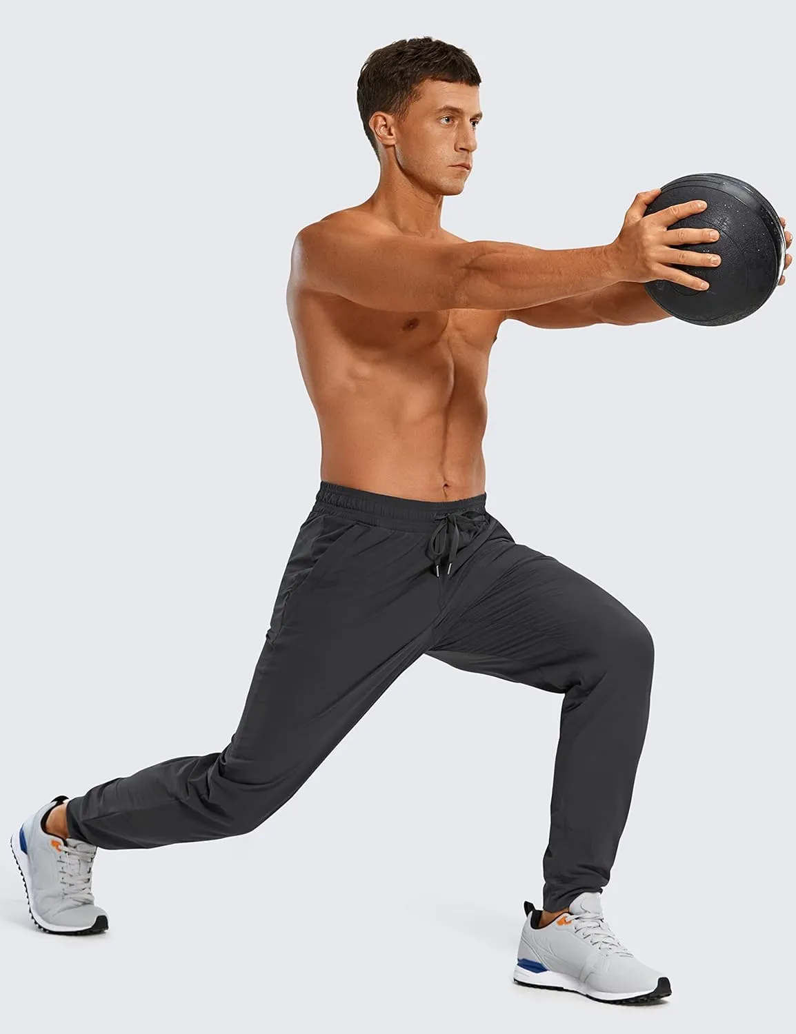 CRZ YOGA Athletic Joggers for Men 29"/31" Lightweight Water Resistant Outdoor Workout Pants with Zip Pockets