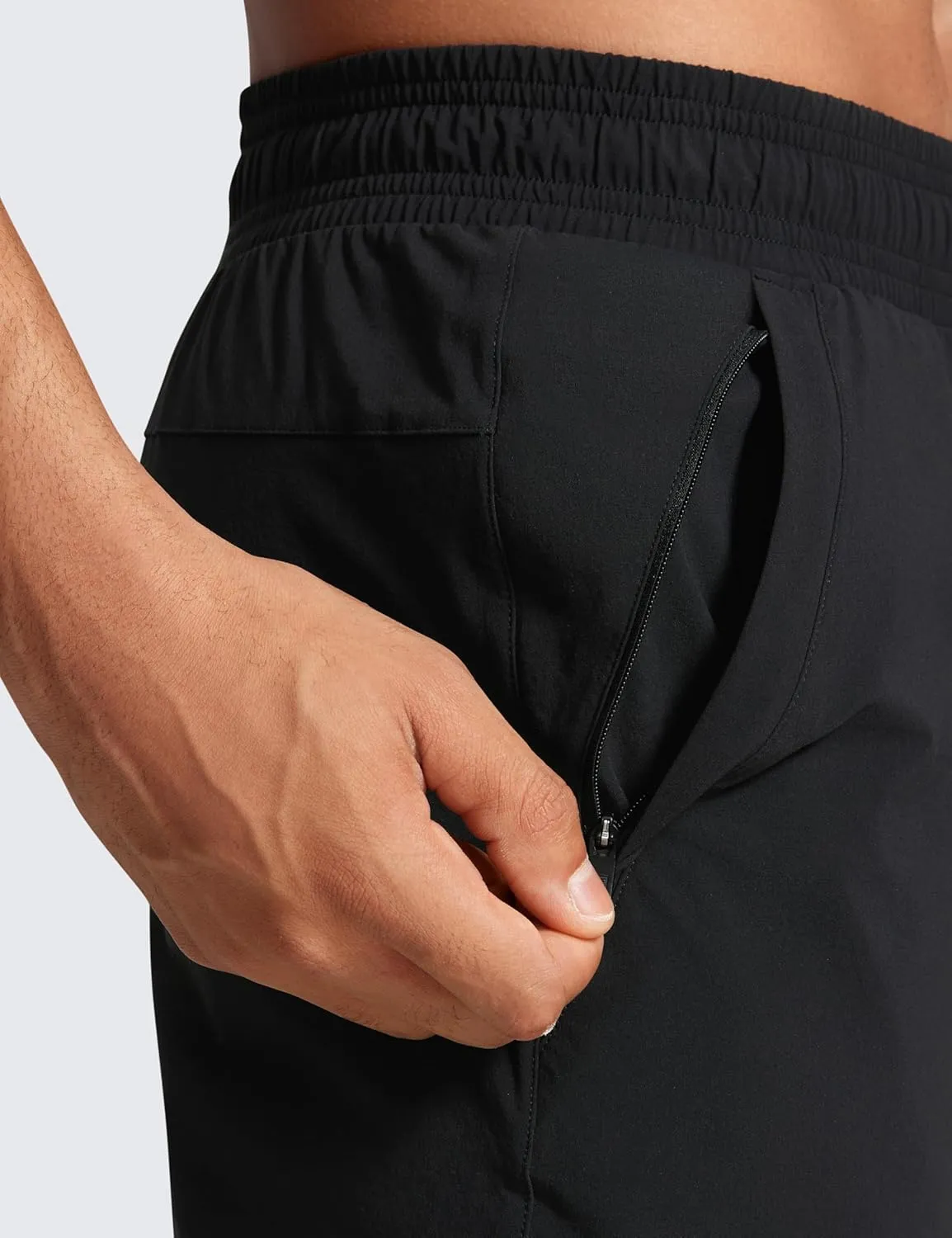 CRZ YOGA Athletic Joggers for Men 29"/31" Lightweight Water Resistant Outdoor Workout Pants with Zip Pockets