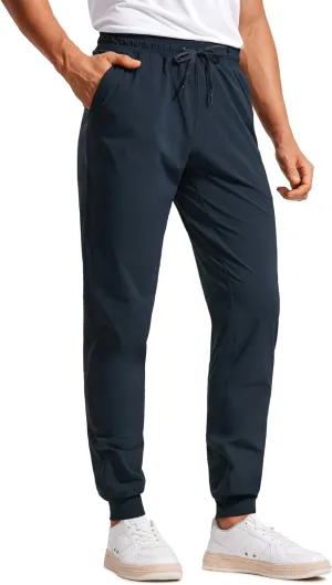 CRZ YOGA Athletic Joggers for Men 29"/31" Lightweight Water Resistant Outdoor Workout Pants with Zip Pockets