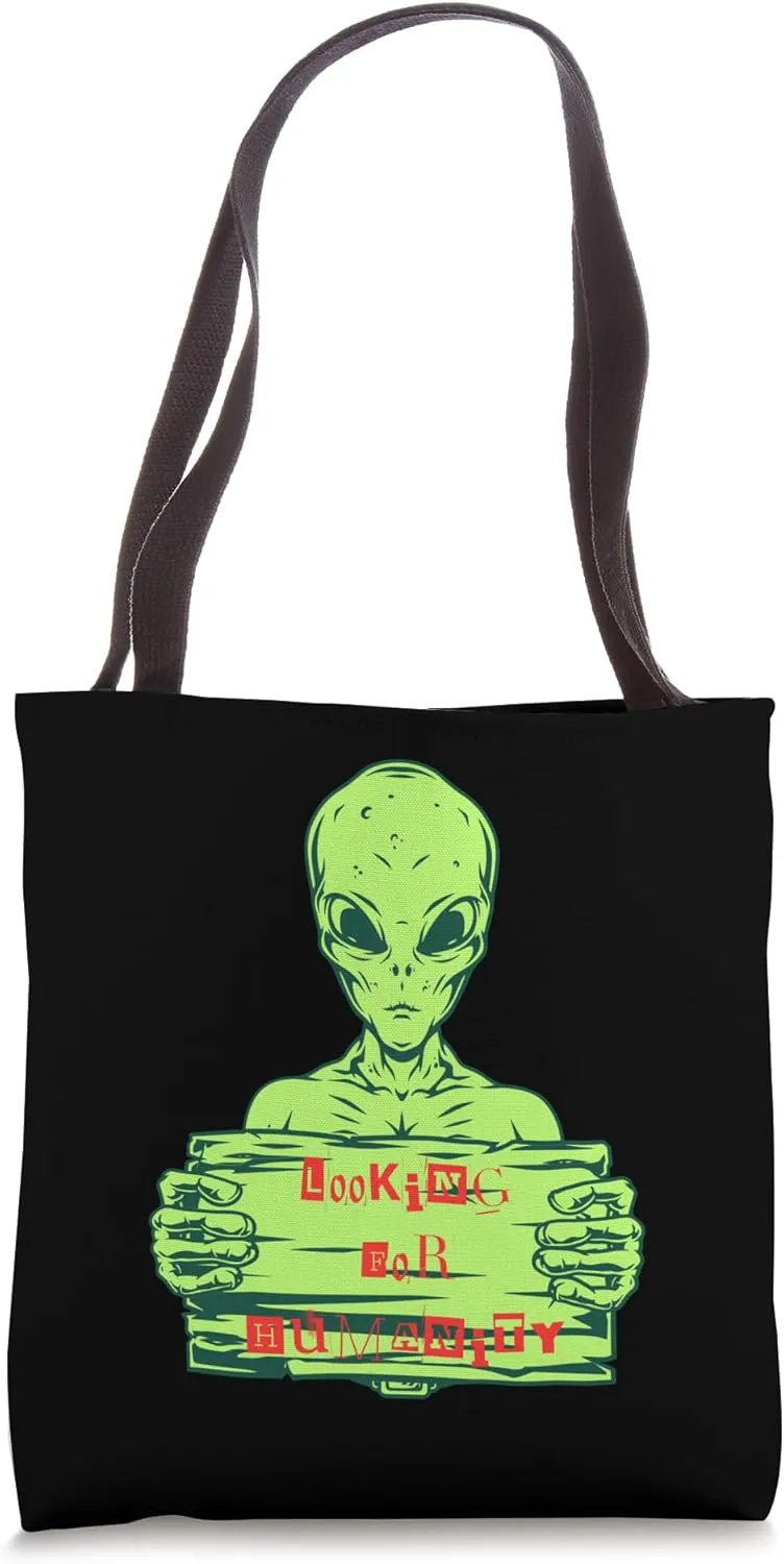 Looking For Humanity Alien Holding Sign Tote Bag