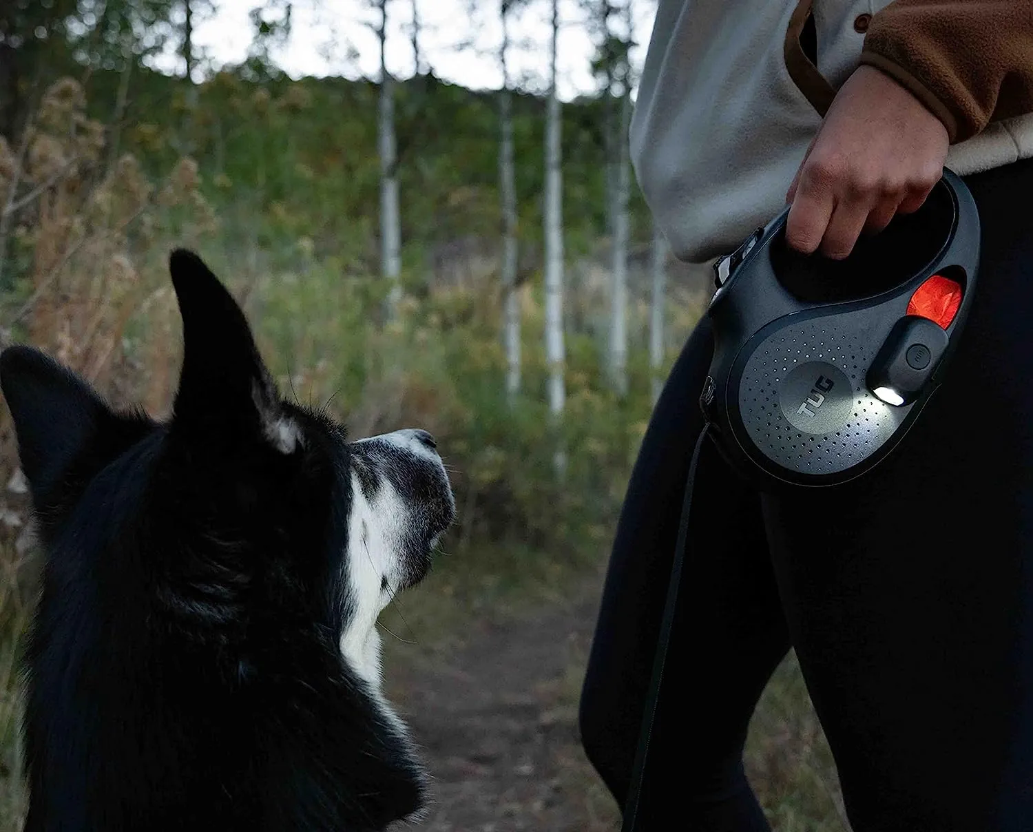 TUG Oval 360° Tangle-Free Retractable Dog Leash | Flashlight Included | Integrated Waste Bag Dispenser Pocket